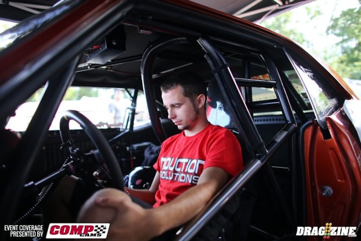 Ronny Rhodes was debating which tuneup to put into the car this morning. We managed to sneak a photo of the book, but he said there was a bullet with our name on it if we showed anyone. He's sitting in 11th after qualifying with a 5-flat and has his work cut out for this morning.