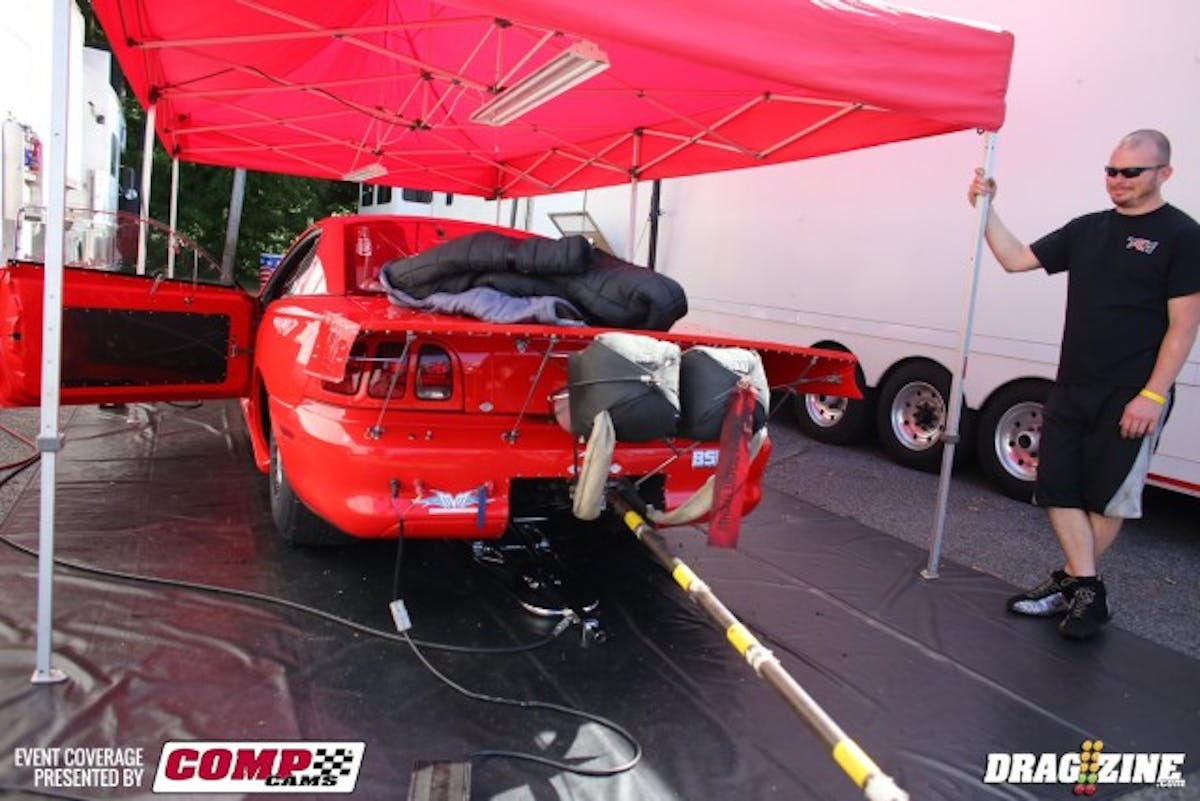 The challenge to find the elusive three-second zone is one that has eluded 'THE' Kevin Mullins thus far. He's currently qualified fifth with a shutdown 4.36 hit but thinks there's a lot more in the car. Here he's pondering whether to make any changes for his matchup with Ev Bernardo this morning.