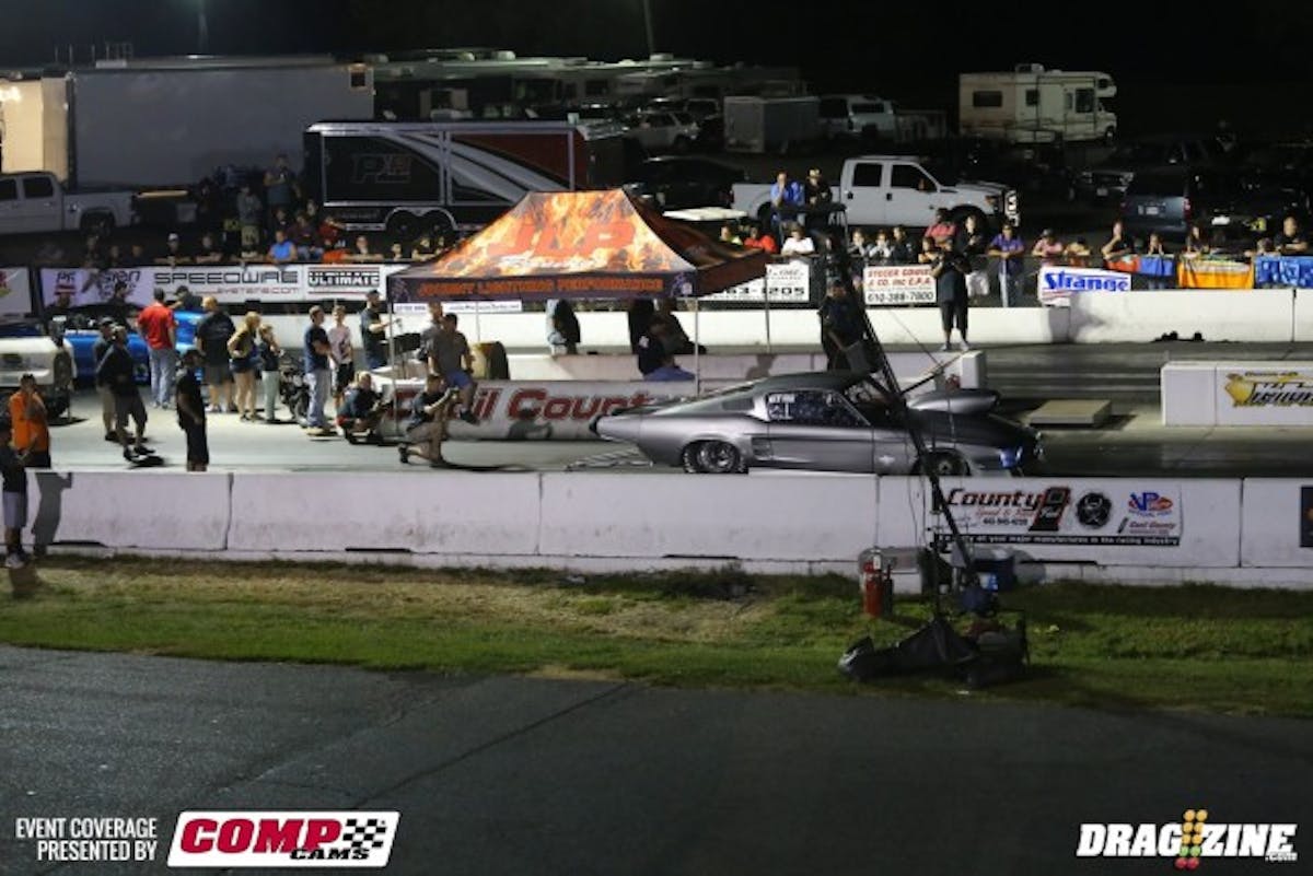 Rich Shainline is moving on, and John Schroeder is not--that's Schroeder being pushed back by his crew after something went awry in the Outlaw Big Tire semifinal. Shainline then proceeded to blow the tires off at the hit--something Schroeder never does. We'd bet it was hot in the Camaro's cockpit.