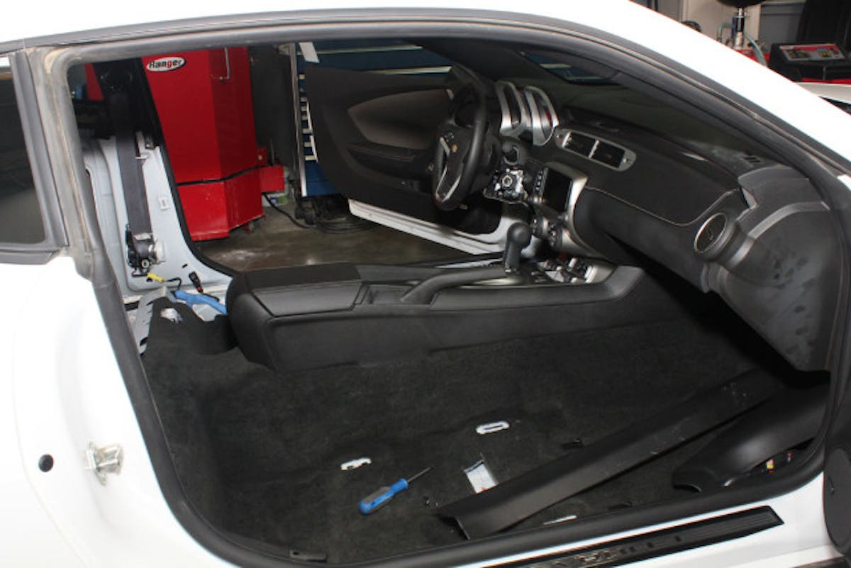 When the Camaro got to the Chevy Hardcore Tech Center, we didn't need to do much disassembly of the interior, as it had been stolen.