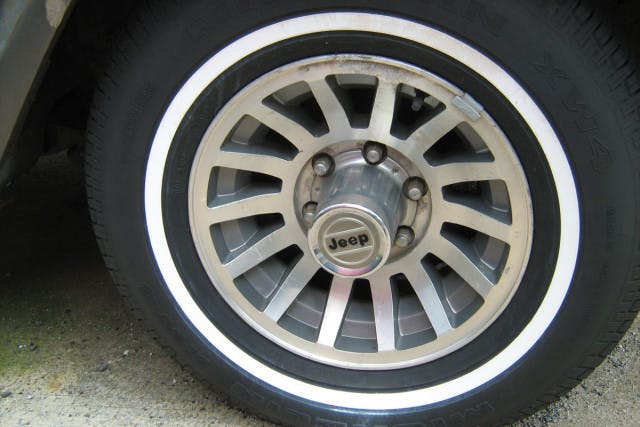 Thinner and thinner: a whitewall tire on a 1970s Jeep shows how narrow the white stripe got as time went on.