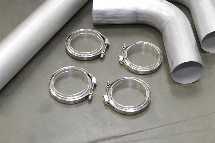 The aluminum V-band flanges are Burns' own design and utilize an o-ring seal.