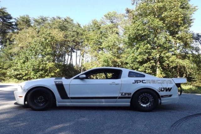 Out back lives a Strange Engineering 8.8 with 9-inch ends, 35-spline race axles, and a spool. To take some weight out of the car, the Boss utilizes a Kirkey racing seat, Optic Armor glass, and Scott Rod Fabrications rear seat and trunk sheetmetal kits. 