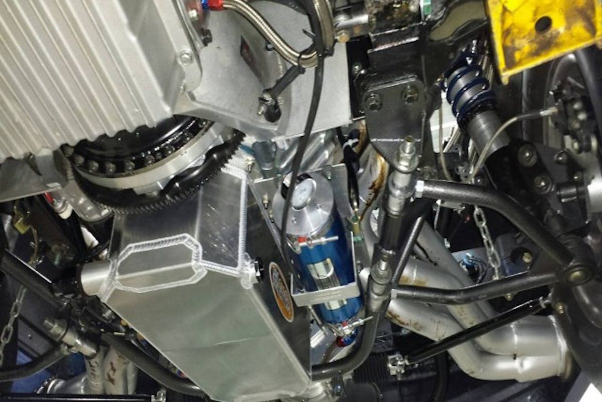 Team Z's Outlaw K-member kit is compatible with increased capacity oil pans and engine diapers. The Outlaw K-member moves the steering rack in front of the oil pan.