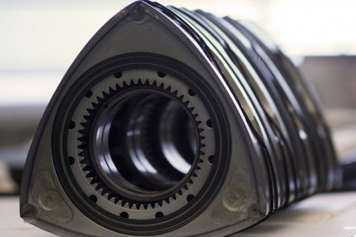 One of the largest challenges to containing emissions i the Wankel has been the apex seal area, where the piston edge contacts the case wall.