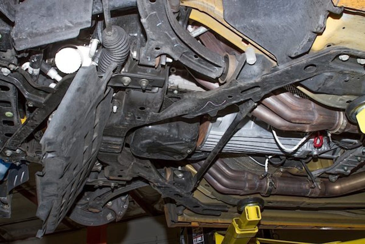 Beginning the prep under the car. Splash shield removed. 