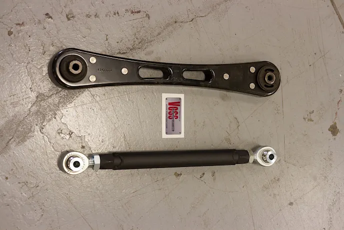 Side-by-side comparison of the stock (above) and Max Motorsports (below) control arms.