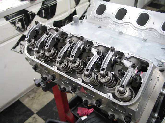 A full set of T&D rockers installed on our blown LS based small block. The ratios are staggered with 1.85 on the intake and 1.85 on the exhaust. The resulting valve lift is almost a full inch at .953 lift on the intake and .918 on the exhaust.