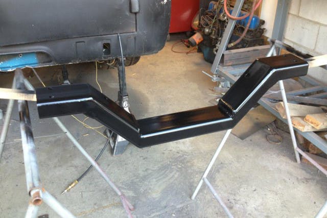 He custom-built a crossmember for the 5.0.