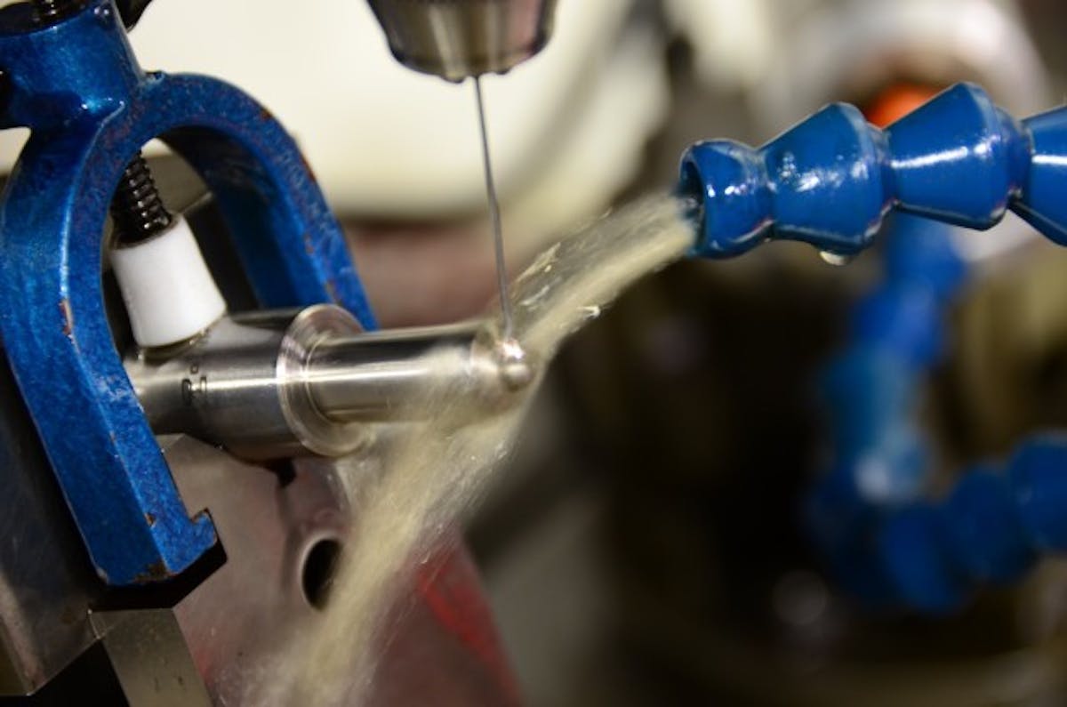 Electrical Discharge Machining (EDM) is a very precise way to enlarge or add holes in an injector tip, and also change the spray pattern. Careful inspection with a 25X power magnifying glass helps to evaluate modifications made to the injector nozzle.