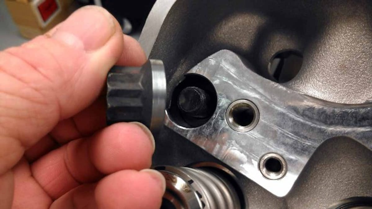 There's not a whole lot of extra room in these head-bolt holes. in fact, Foxwell had to turn down the exterior dimension on all of the nuts in order to lock everything down.