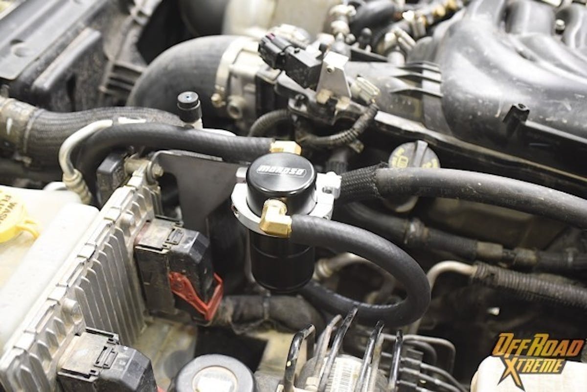 The installation of the Moroso air-oil separator can easily be done in the garage for the DIY auto enthusiast. Not requiring any special tools makes the installation something that does not take a lot of mechanical skill, but yields a great benefit for an off-roader.