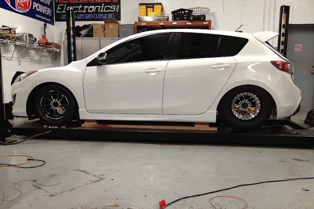 We think term "Sleeper" goes out the window once you spot those 275-wide slicks in the rear.