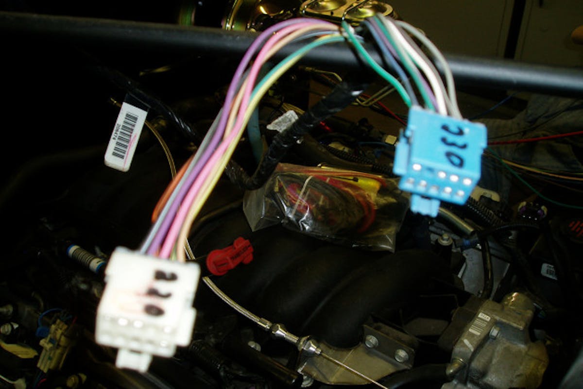 Jim had lots of help from friends, one of whom pinned out the wiring harness so everything would work.