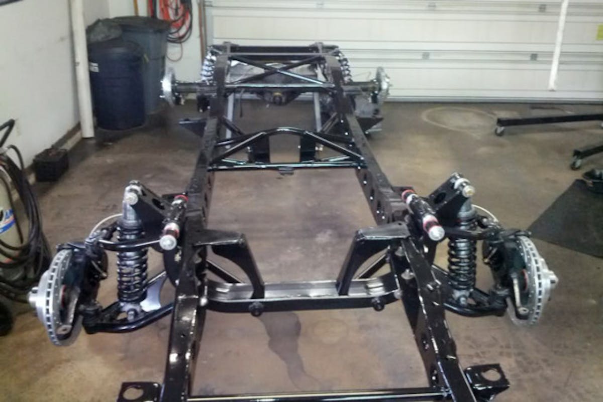 With the body off you can see the suspension mods Jeff did, although these weren't required for the LS swap.