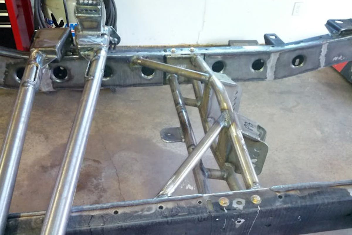 Showing some of the rear suspension and frame bracing that was added.