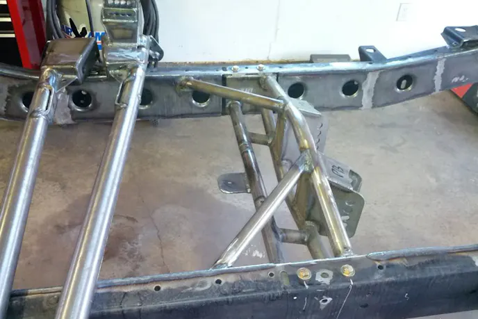 Showing some of the rear suspension and frame bracing that was added.
