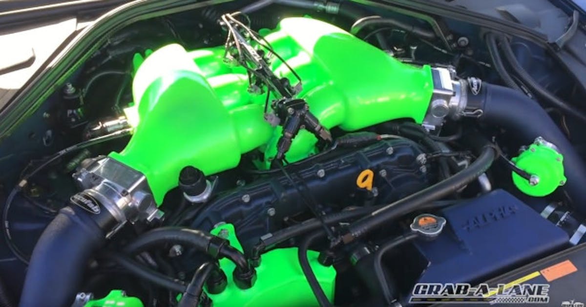 A little peek under the hood reveals more accents in the lime green theme, carried over from the interior.