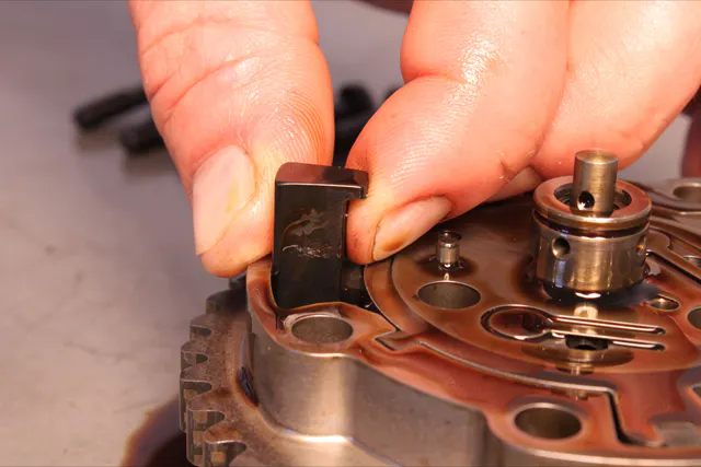 The lockout kit (shown above) is not required for 2015 Coyote engines due to the mid-lock camshaft phaser.