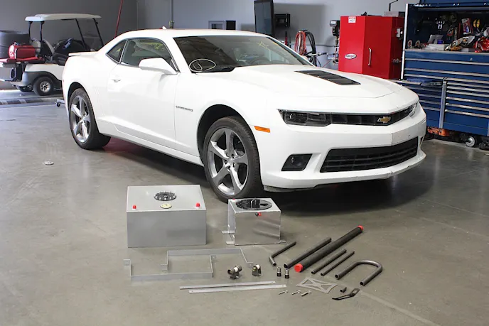 The full menagerie of Rhodes Race Cars parts going in True SStreet include a roll cage (not pictured), driveshaft hoop, fuel cell, and intercooler tank.