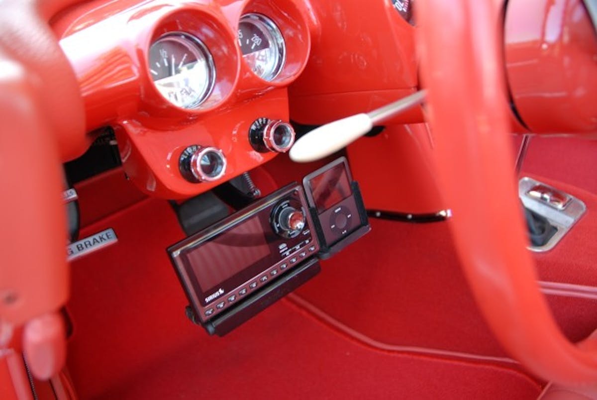 A hidden mechanism  swings from under the dash to reveal a Satellite Radio and iPod controls. Other electronics include a keyless entry and phone/Bluetooth operating through the sound system.