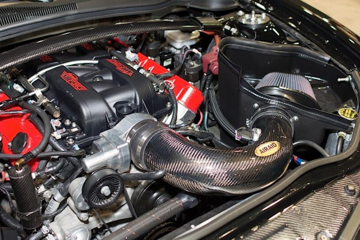We think carbon-fiber makes a great addition under any car's hood