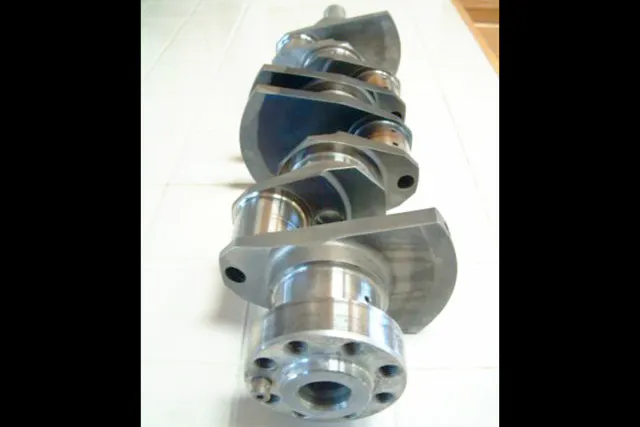 A flat-plane crank, shown here, has the rod throws spaced at 180 degrees. Typical V-8s have a 90 degree spread.