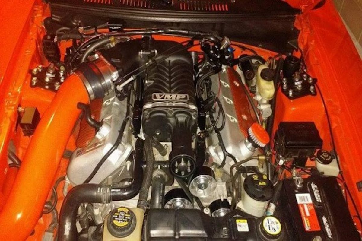 Just a stock Cobra engine with a VMP TVS 2.3 supercharger upgrade, Metco pulleys, a JLT intake, and a new fuel system. Smith tells us the stock engine has just 24,000 miles on it.