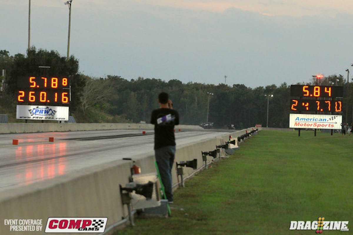 Ricky Smith and Kevin Fiscus were the first pair out in Pro Mod this afternoon making the quickest side by side match ever here in Orlando. Smith took the tree and the win light with a 5.84 at 247 though that's not so relevant in qualifying. For his part Fiscus ran a 5.78 at 260 putting both cars well under the current ET record of 5.92. It's safe to say the game is afoot.