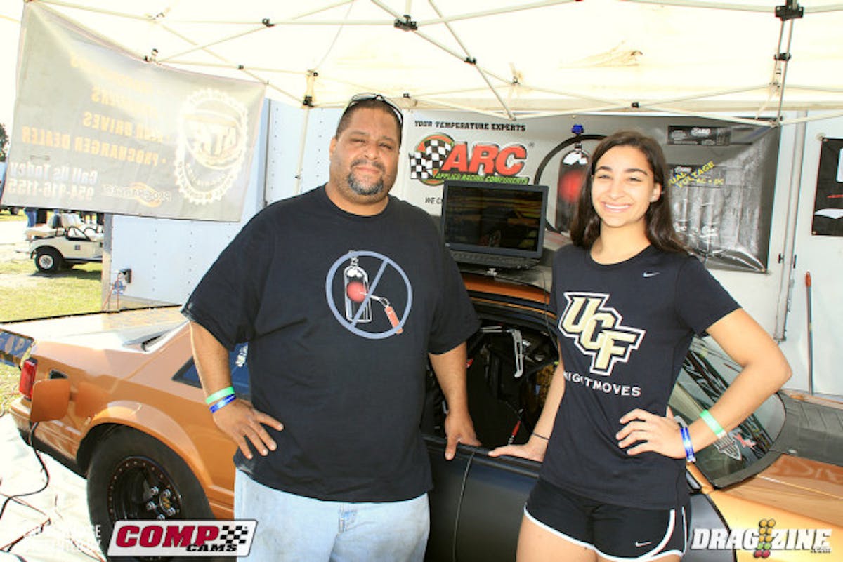 We caught up with Enrique Pirez  putting his second round tune up in the car this morning for driver Ari Birchfeild. The team had a new personal best winning Ultra Street in Palm Beach two weeks ago and ran a 5.05 while testing here Thursday. Enrique is shown here at left with his niece Ariel Birchfield.