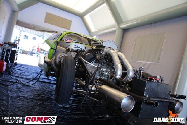 Ruben T's Pro Mod Camaro is a badass machine; he's eighth on the ladder with a 6.04 . He explains that the weather here in Vegsas is so different from where he normally competes that he had to make a run just to see what the car would take. On top of the car is the unique pneumatic awning system he developed (and sells, wink-wink) that he says inflates in six minutes and costs half as much as a typical stacker-based awning system. We were impressed, not only with the engineering but also the much cooler temperatures underneath. Racers are an ingenious bunch. 