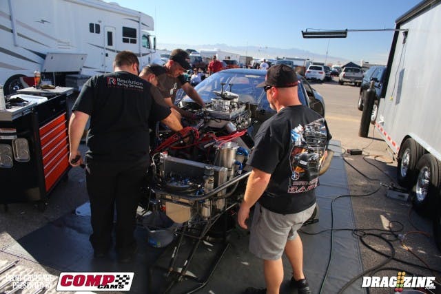 "Nitrous life" was the only comment we got out of the Bad9er crew this afternoon. Shortly after the comment, a rack of pistons appeared on the table and many hands went to work. 