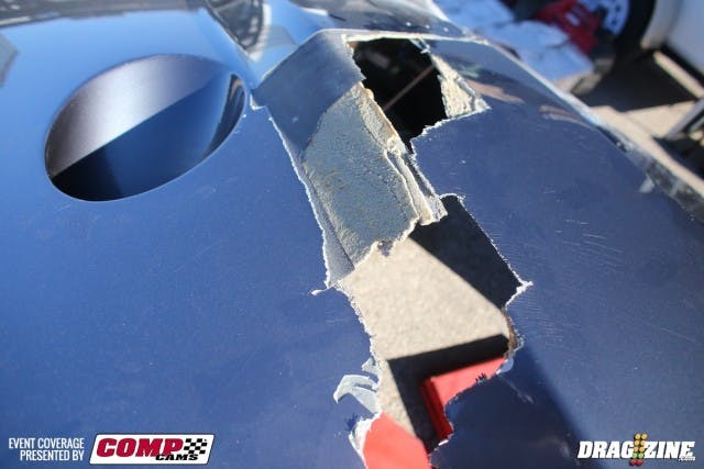 We'd guess that Larry Larson doesn't like it when the intake manifold explodes due to an underhood issue. He was in the Fiscus pits this morning working the welder to repair the manifold -- this is what the damage did to the carbon-fiber nose. 