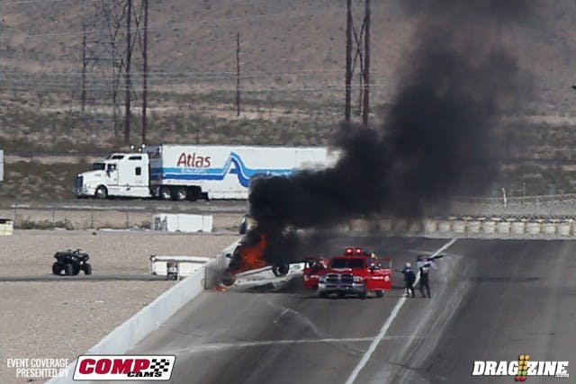 Where the car burst into some serious flames. The LVMS crew was on the scene almost before the car stopped spinning to extinguish the flames. We have a report that Luton is out of the car and is OK, although we're sure he'll be sore tomorrow.