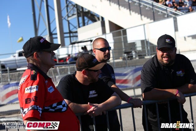 Three of the sharpest minds in the business -- Mark Menscer (left middle), Rich Bruder (right middle), and Tom Kundrik (right) of Mickey Thompson Tires. Not sure who the guy in the red shirt is..maybe he was trying to learn something?