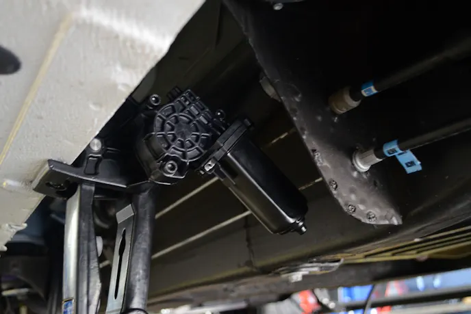 The rear motor mount and linkage assembly in place.