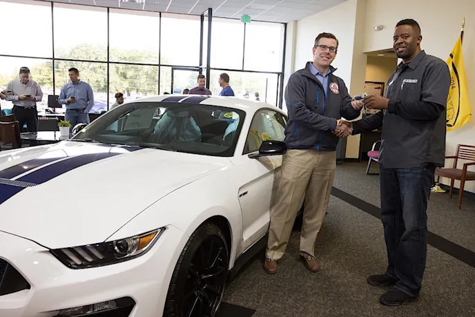 Aaron Shelby taking deliver of his brand new 2015 Shelby GT350 dawns a most memorable moment in Shelby history.