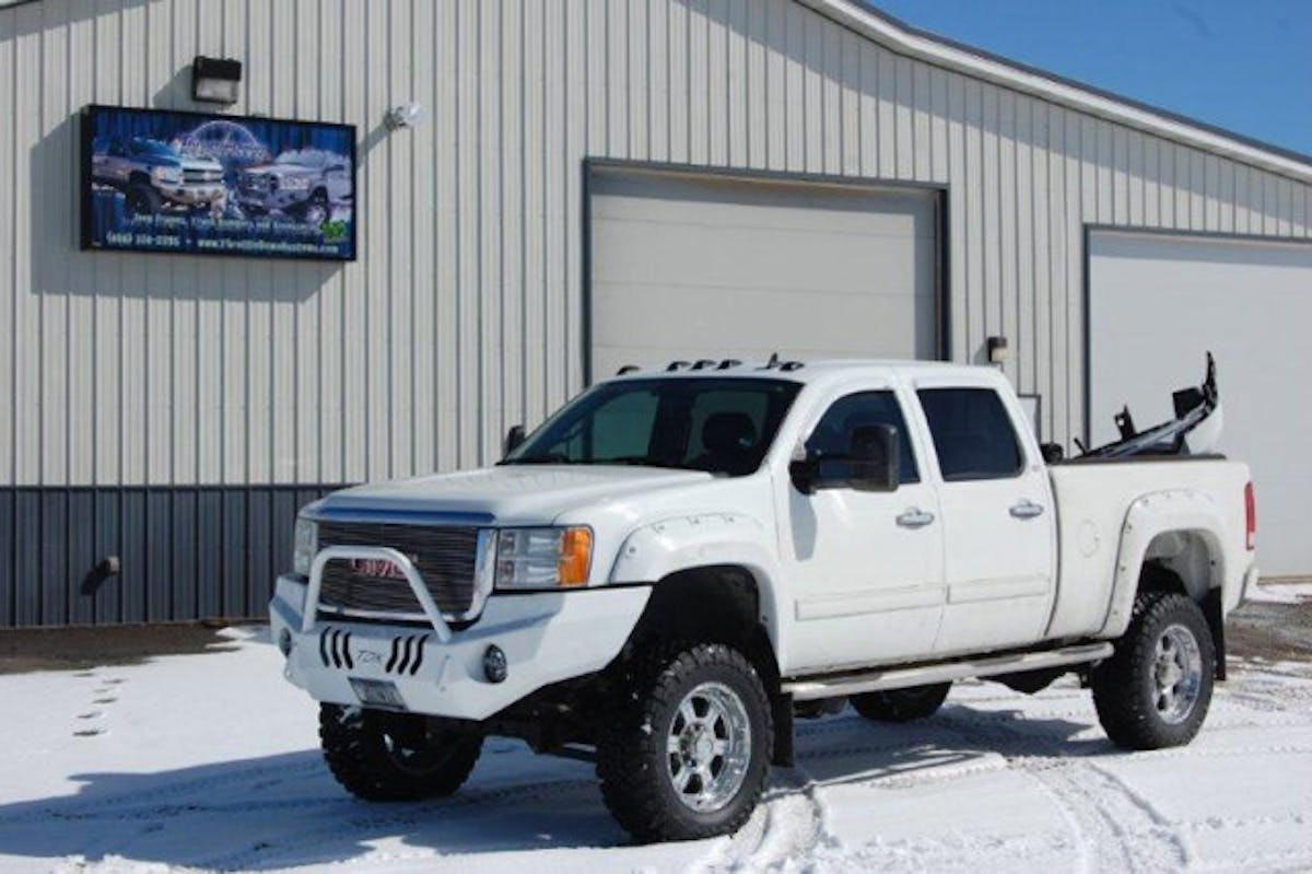 The Prerunner bumper on a GMC with round lights.
