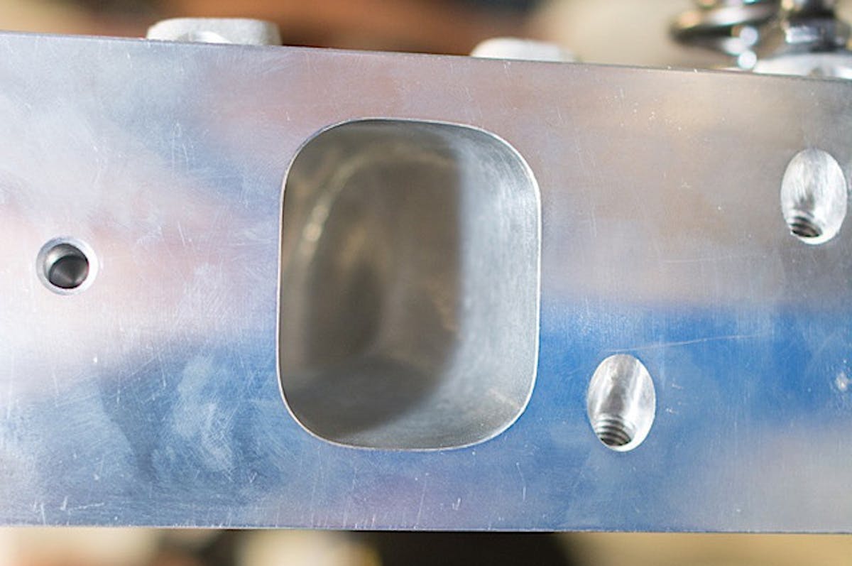 Emphasis was also placed on raising the intake port floor location to improve it s performance over competitor's designs.