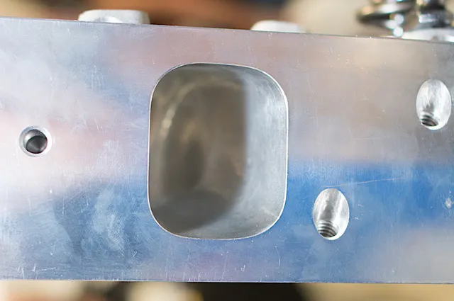 Emphasis was also placed on raising the intake port floor location to improve it s performance over competitor's designs.