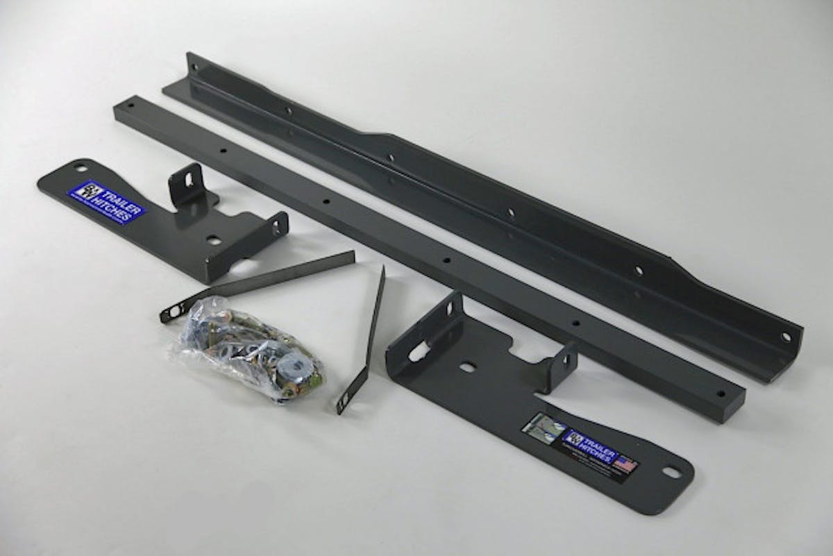 Sideplates like these were designed to bolt to existing holes in a truck's frame, in keeping with an approach that made minimal permanent modifications to a vehicle.