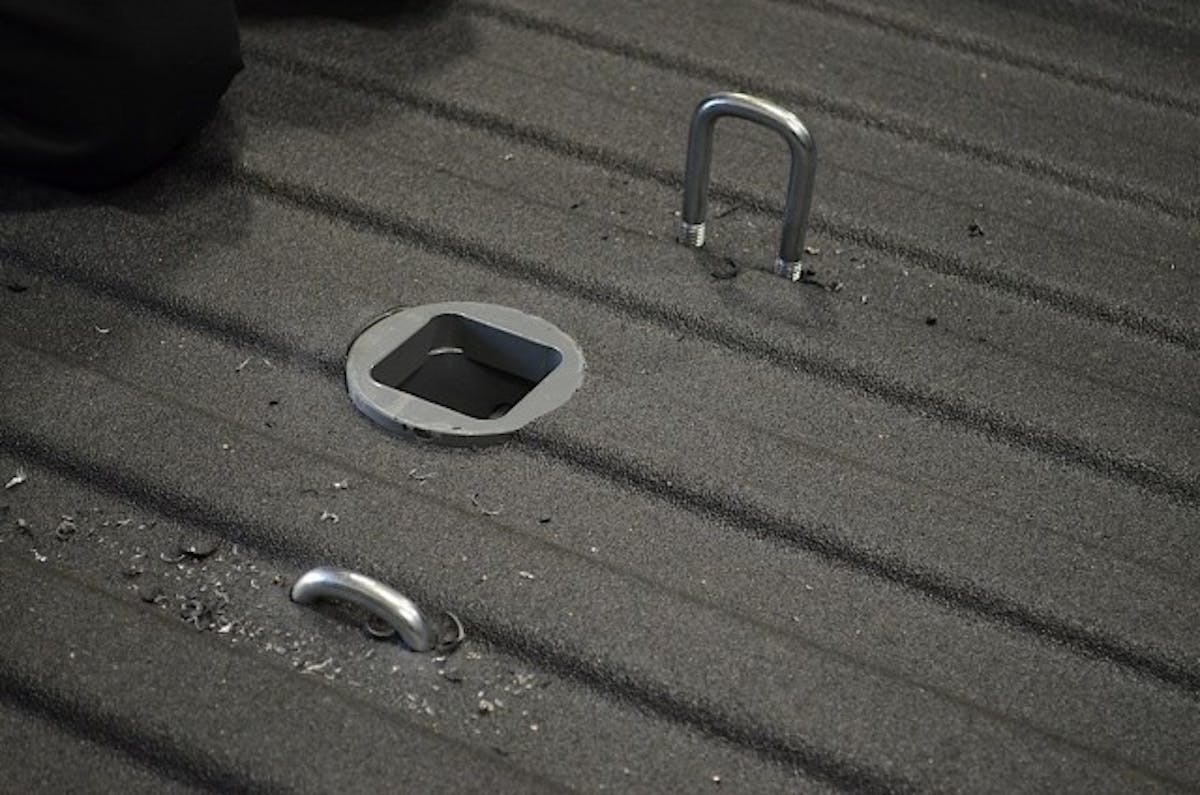 The safety chain U-bolts drop right in and are given springs underneath to provide tension to hold safety chain hooks in place when all is said and done.