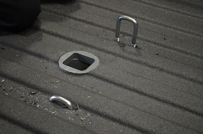 The safety chain U-bolts drop right in and are given springs underneath to provide tension to hold safety chain hooks in place when all is said and done.