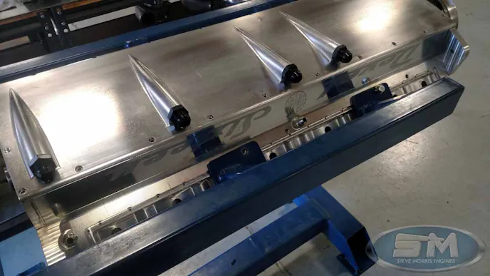 A billet oil pan design was developed after the initial pan sucked right up to the bottom of the engine during testing.