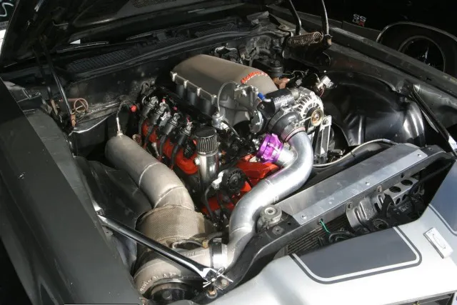 That is your basic LS engine, but bolstered with a Tick Performance cam, a Holley Hi-Ram intake and throttle body, and 23 pounds of boost from a Borg Warner S475 single turbo. With a Turbo 400 in the tunnel, and 3.08 gears out back, Adam Hodson's Camaro is good for mid-9s in the quarter-mile. 