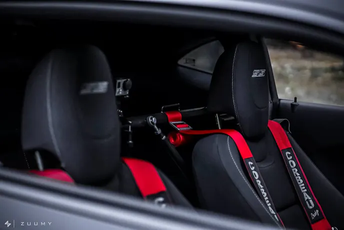 With a car built to handle the twisties, racing harnesses are a good idea to keep you in the seat during spirited driving. Of course, the Go-Pro is on board to record such exploits.