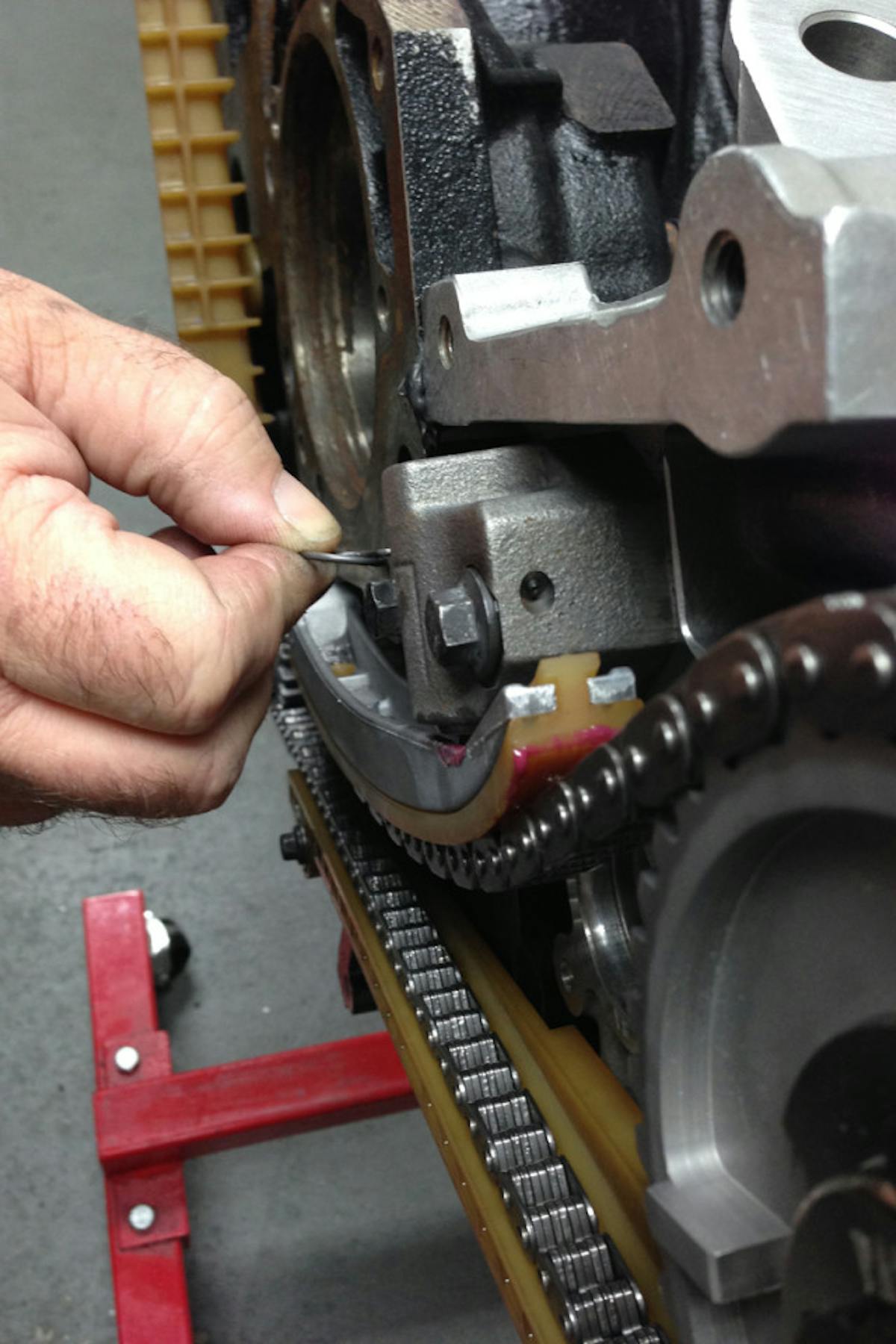 Pulling the pin on the tensioner. Timing chain tensioners provide dynamic stability for overhead cam applications.