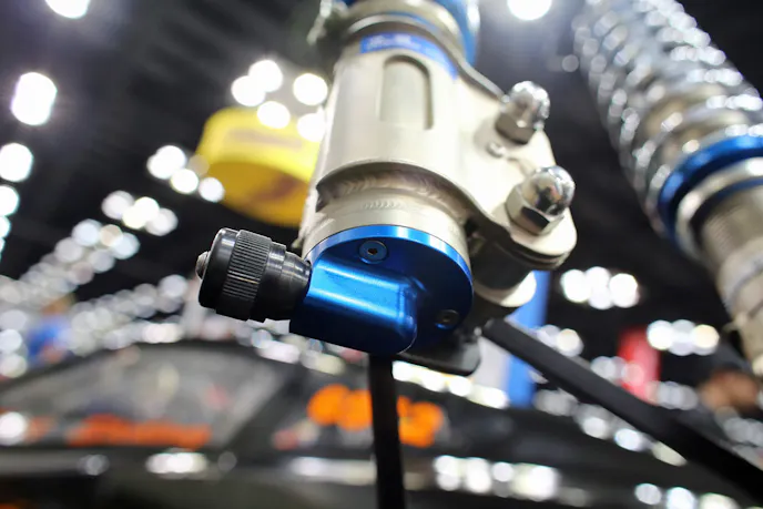 Indexable compression adjuster