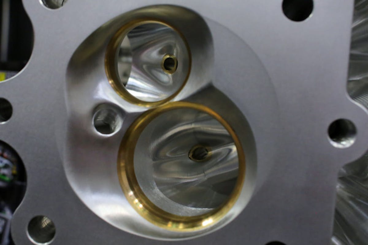 Chamber softening is done on the heads to permit a wider window for tuning adjustments; the amount and angle of softening, along with valve-seat materials is tailored per the application.