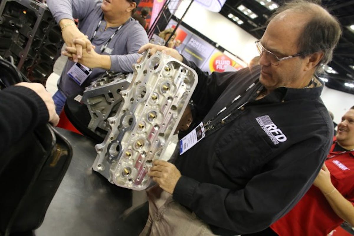None other than Race Flow Development's Curtis Boggs inspecting the new Dart billet LS head; we overheard Boggs say "This is a nice piece; I can work with this." That's a solid endorsement.